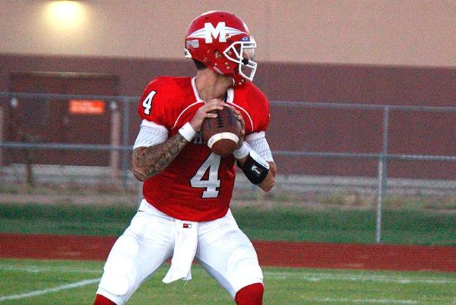 Austin Apodaca scrambled for a 41-yard TD to help wrap up Mesa's 21-10 win over Phoenix (Photo by Jacob Dewald)
