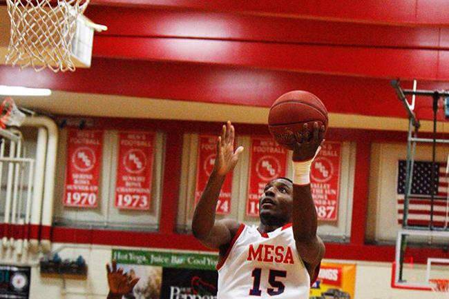 Mitch Burnett goes in for a layup (photo by Jacob Dewald)