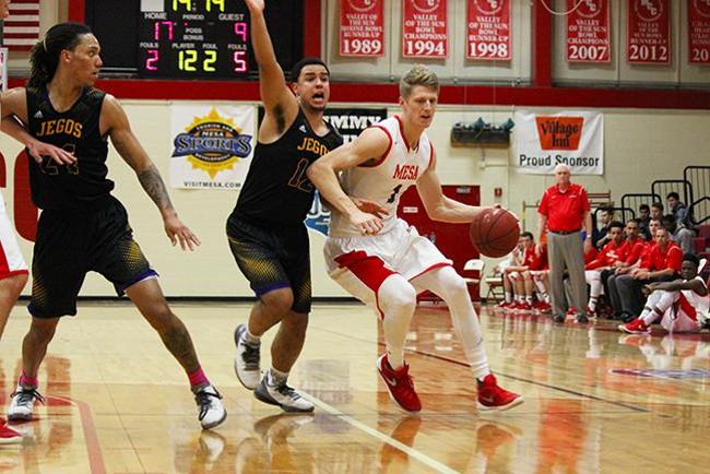 Kyle Bingham(#1) scored 15 points, had eight rebounds and four blocks in the win over Tohono O'Oodham