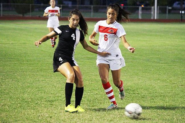 Victoria McClelland(#6) battles for the ball against Chandler-Gilbert