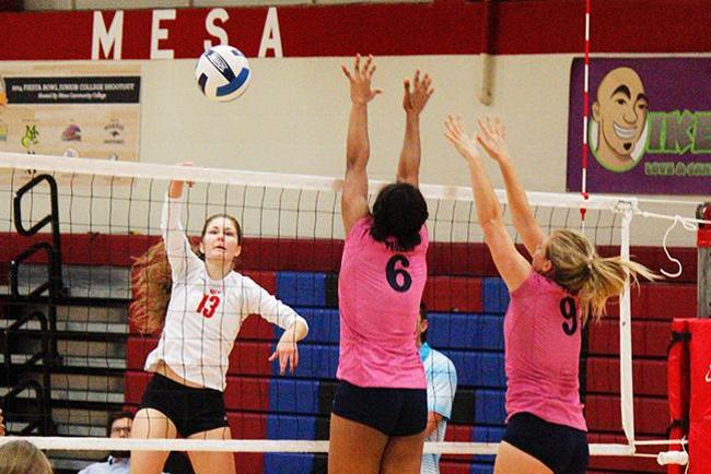 Chelsey Stover hits the ball over against Phoenix College(photo by Jacob Dewald)